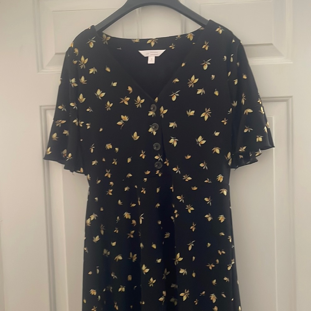 Lauren Conrad size Small fully lined black dress with yellow flower print